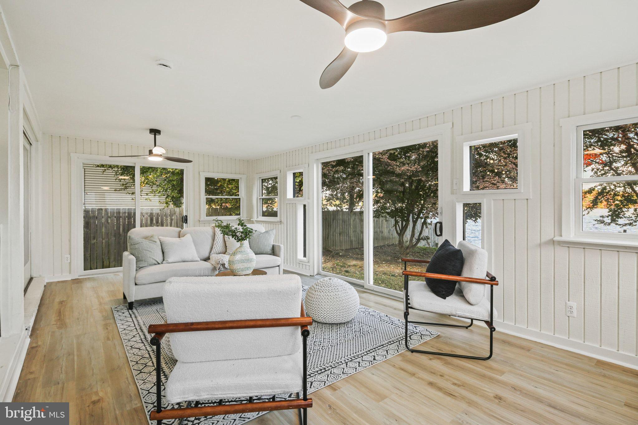 515 Freys Road Edgewood, MD 21040 - Photo 15 of 43 a living room with furniture and a floor to ceiling window
