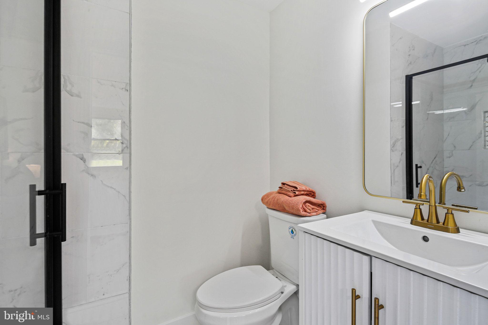 515 Freys Road Edgewood, MD 21040 - Photo 18 of 43 a bathroom with a sink a toilet and shower