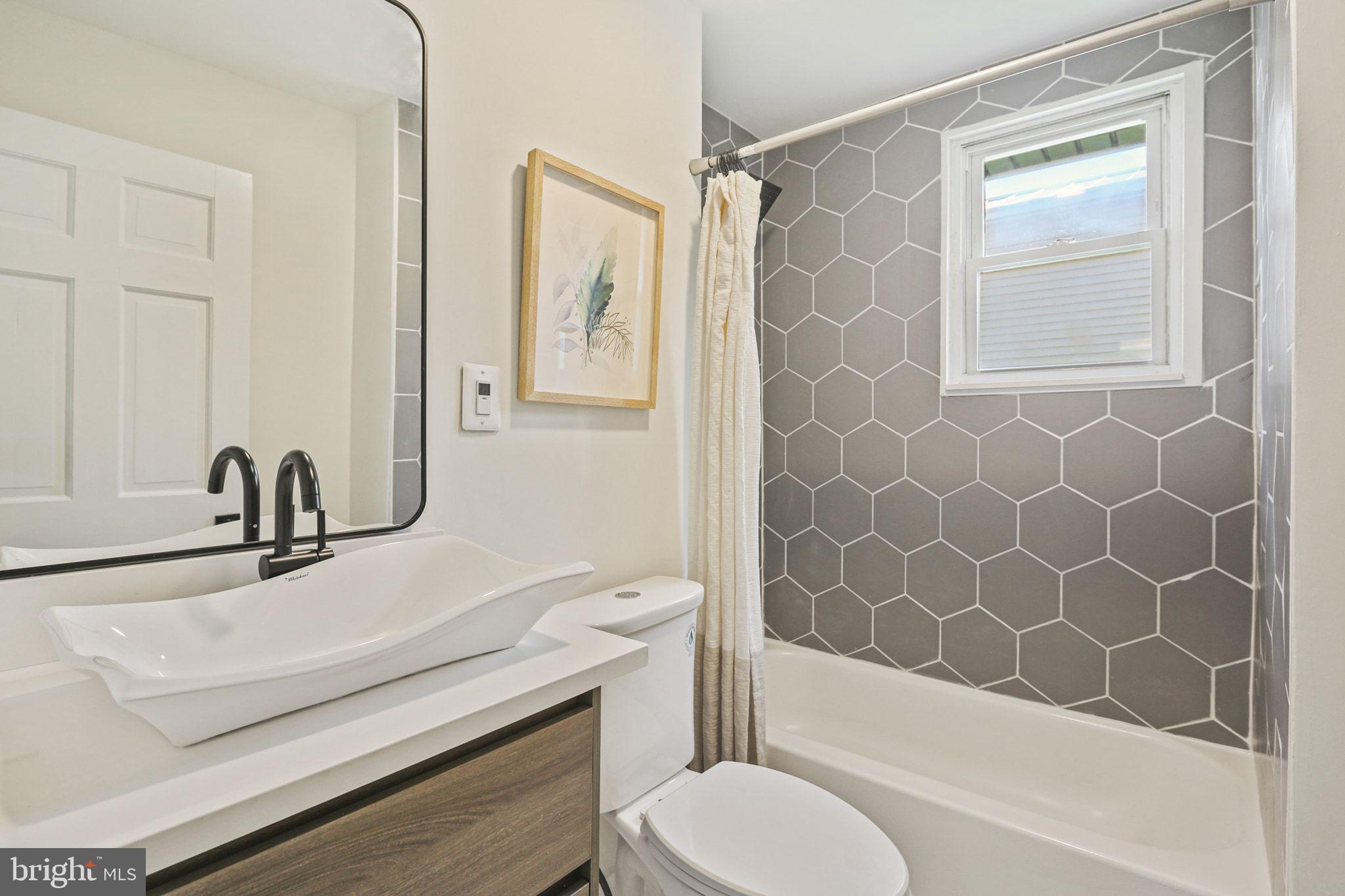 515 Freys Road Edgewood, MD 21040 - Photo 21 of 43 a bathroom with a sink toilet and shower