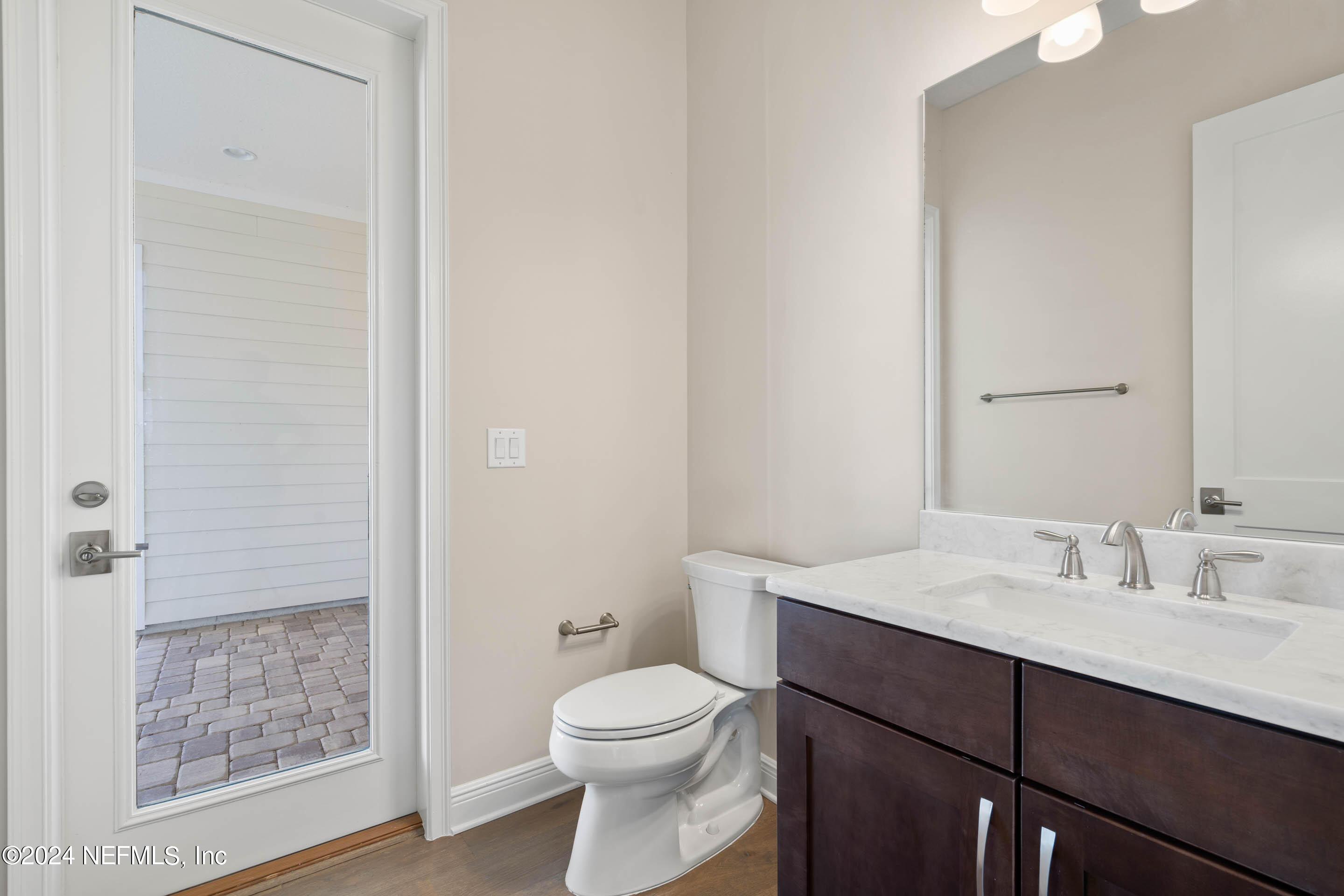 55 Rum Runner Way St. Johns, FL 32259 - Photo 15 of 55 a bathroom with a sink a toilet and shower