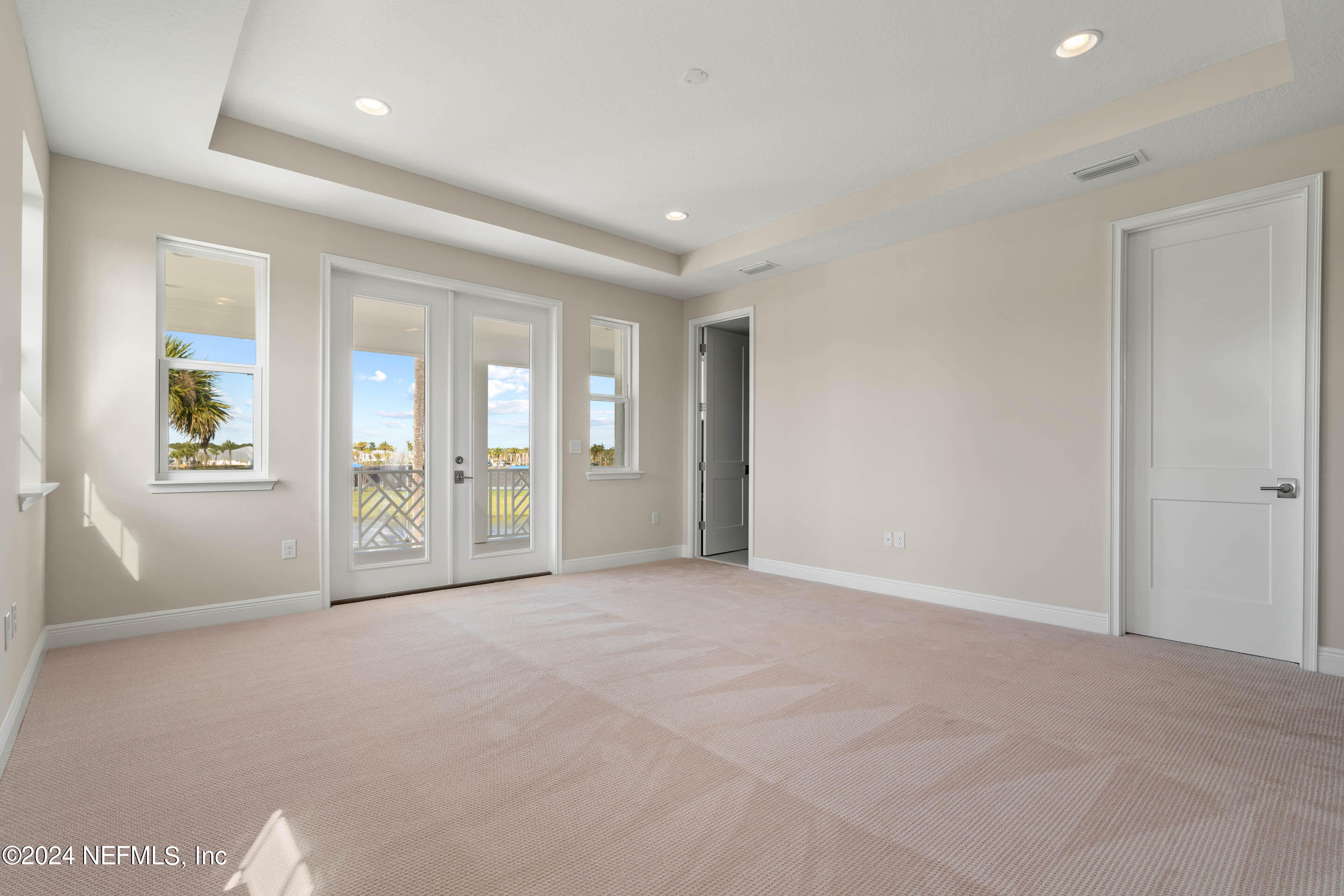 55 Rum Runner Way St. Johns, FL 32259 - Photo 21 of 55 a view of an empty room with glass door
