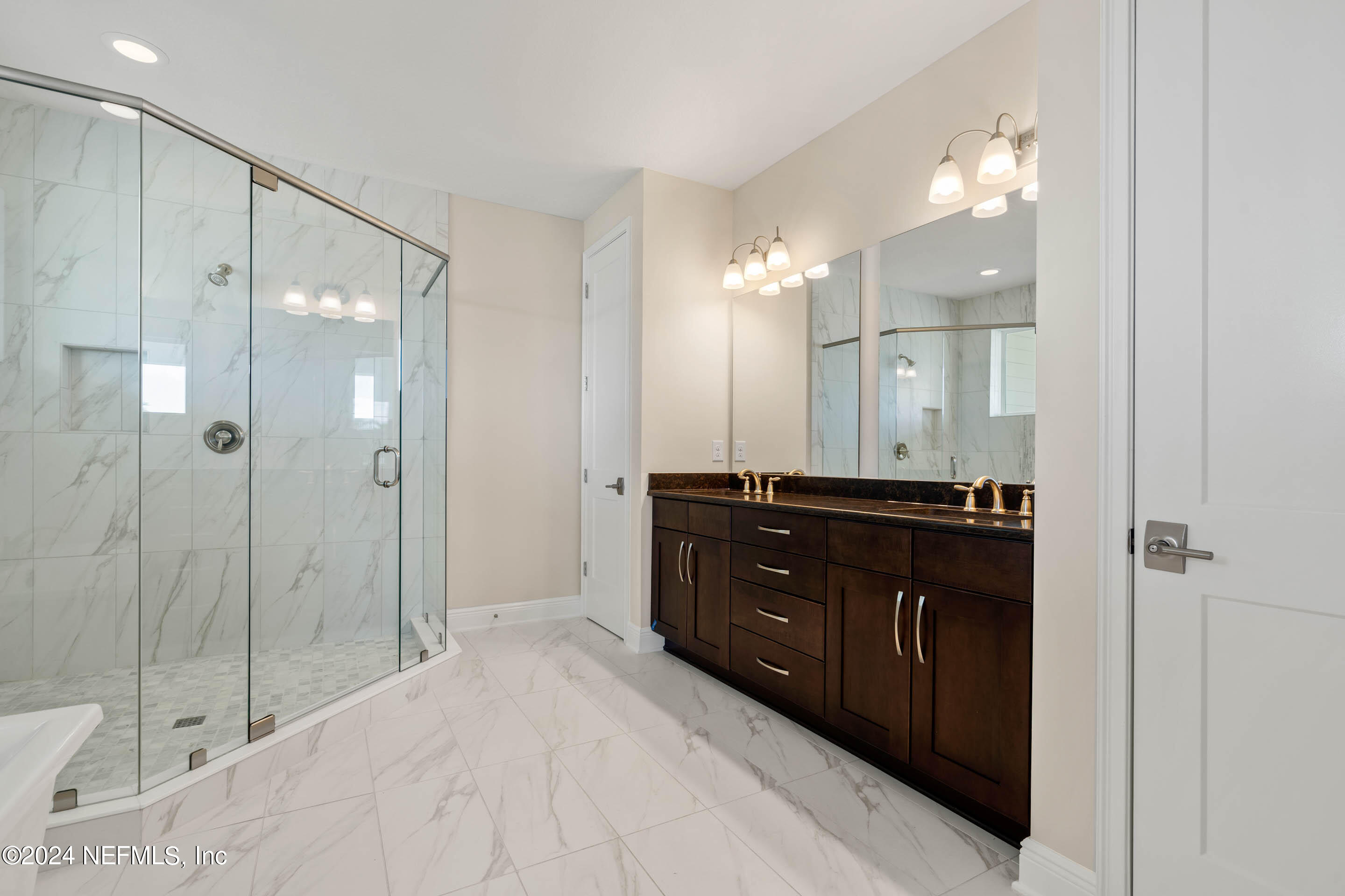 55 Rum Runner Way St. Johns, FL 32259 - Photo 23 of 55 a bathroom with a sink vanity and a mirror