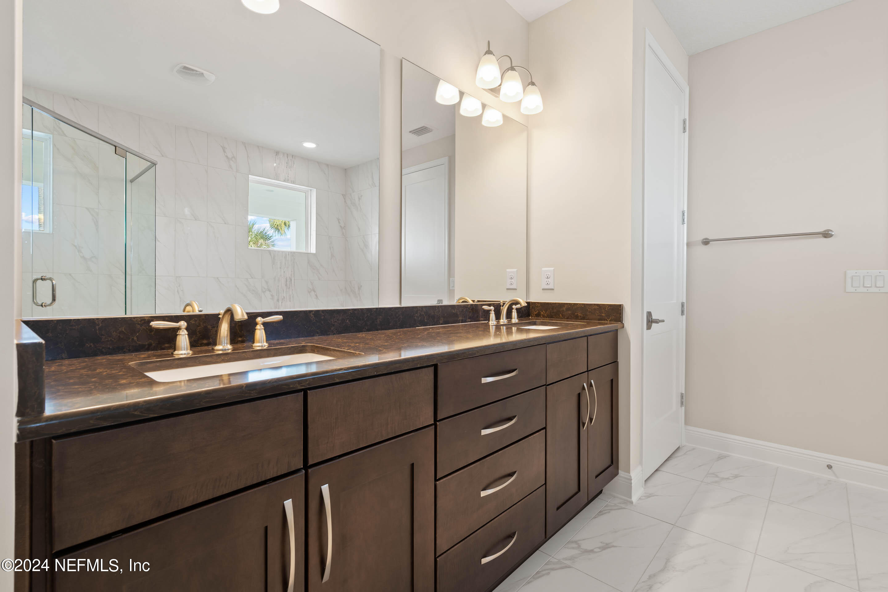 55 Rum Runner Way St. Johns, FL 32259 - Photo 25 of 55 a bathroom with a sink double vanity and a mirror