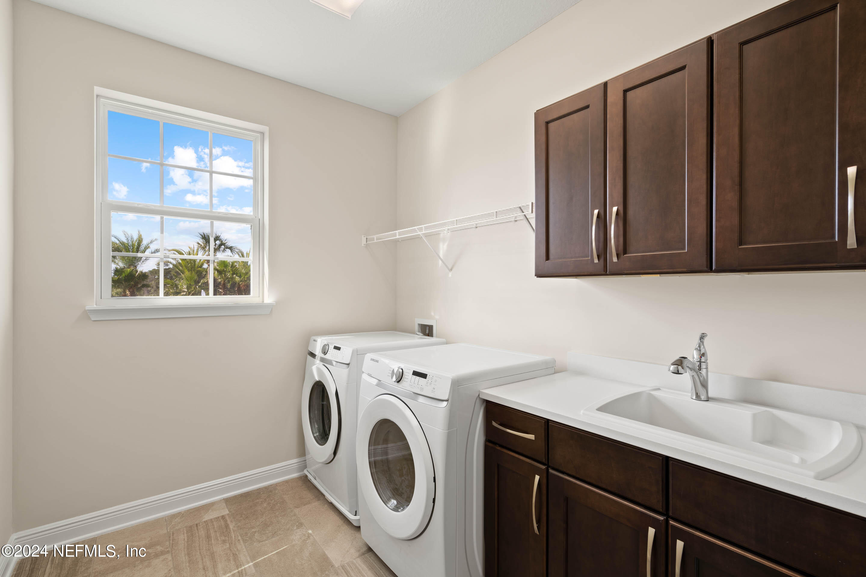 55 Rum Runner Way St. Johns, FL 32259 - Photo 27 of 55 a utility room with dryer and washer