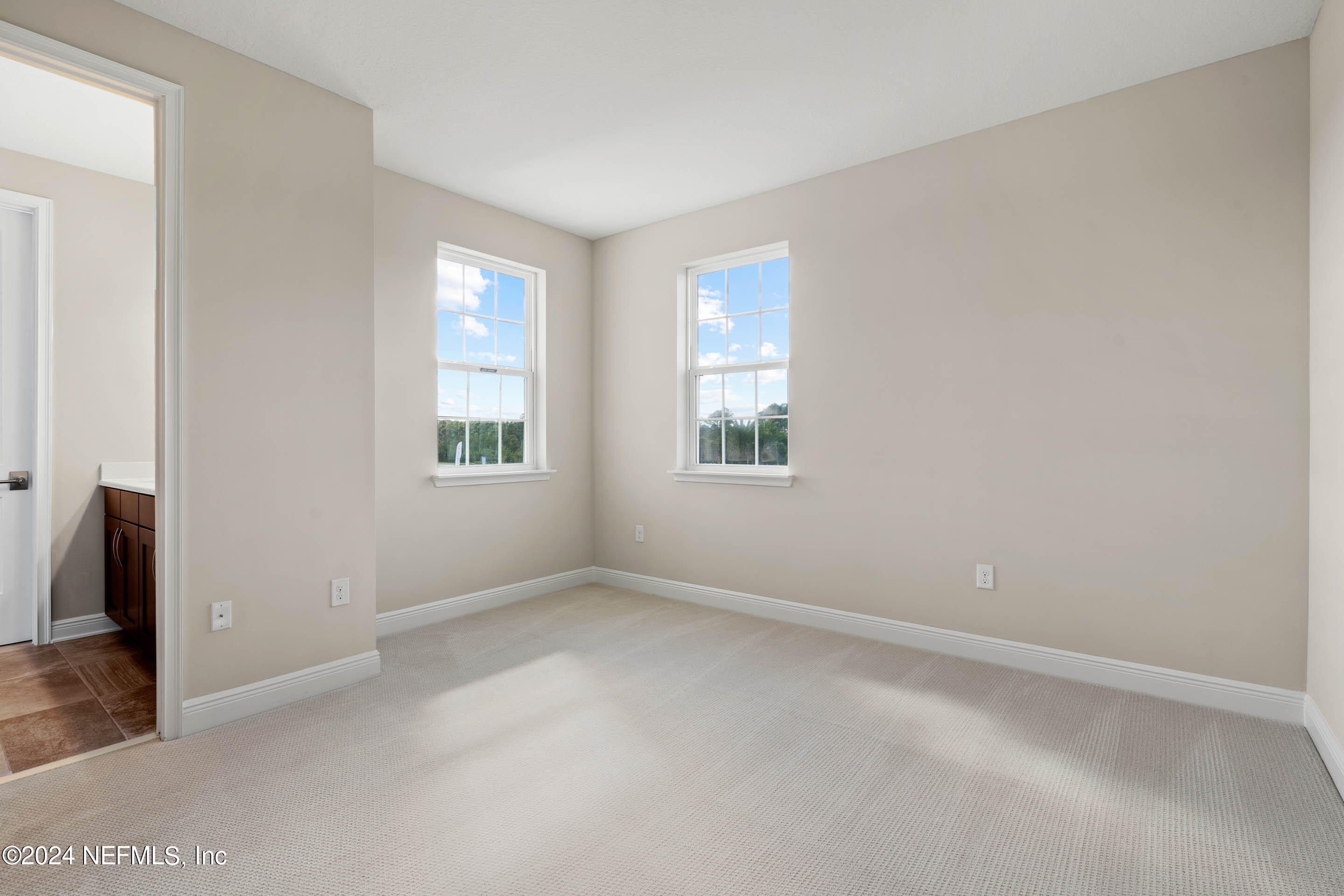 55 Rum Runner Way St. Johns, FL 32259 - Photo 31 of 55 an empty room with windows