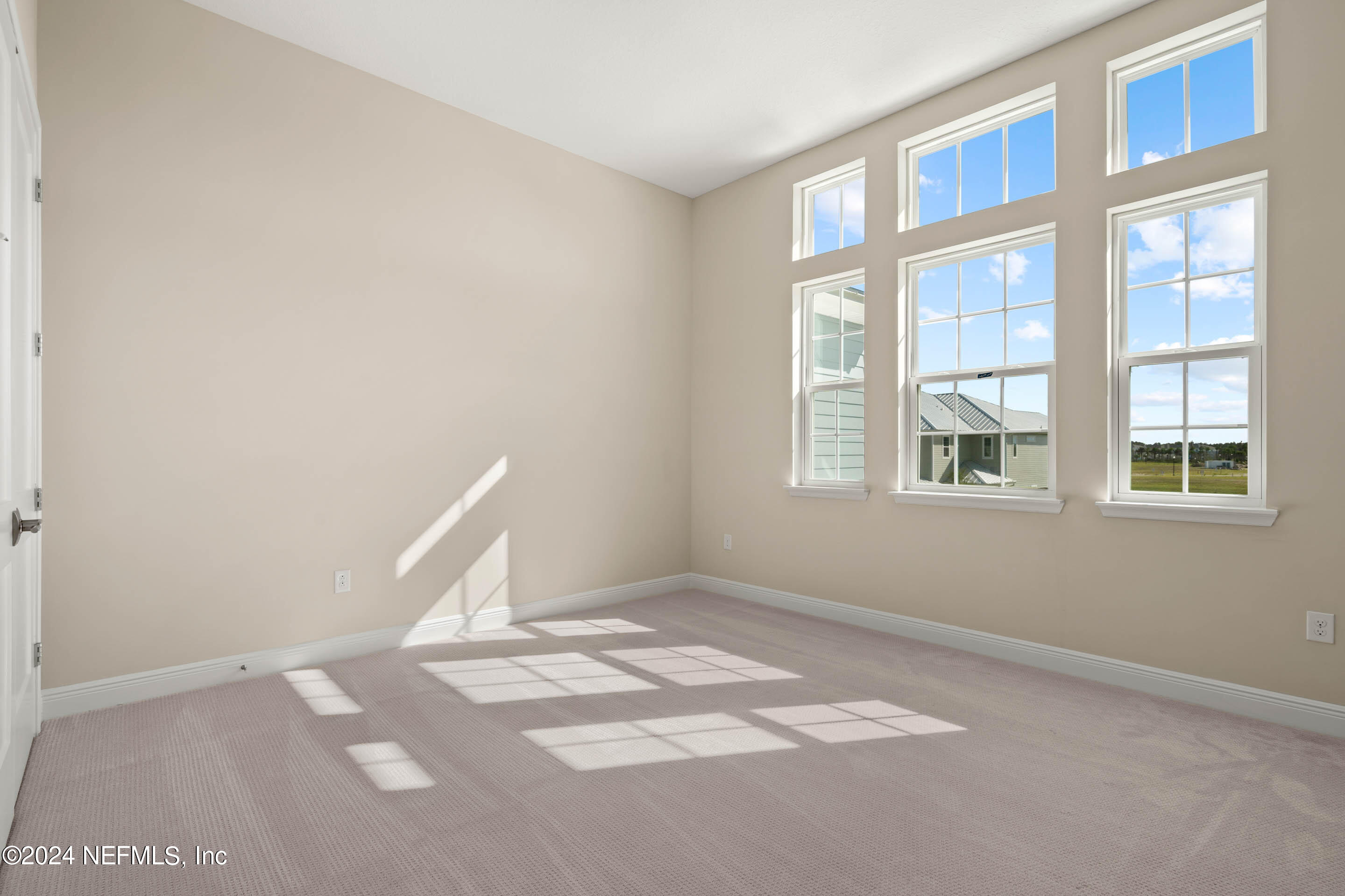 55 Rum Runner Way St. Johns, FL 32259 - Photo 32 of 55 a view of an empty room with a window