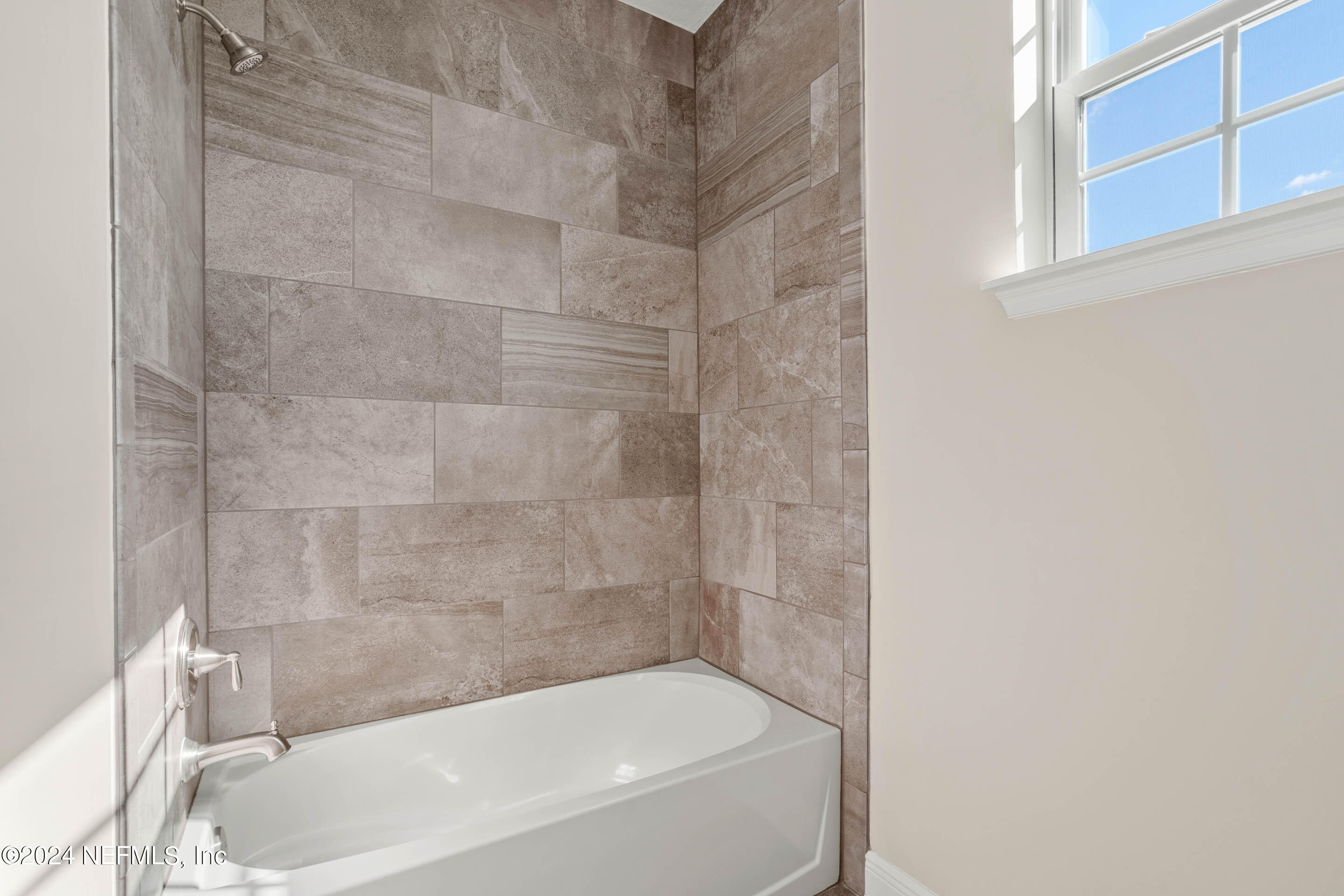 55 Rum Runner Way St. Johns, FL 32259 - Photo 34 of 55 a bathroom with a bathtub