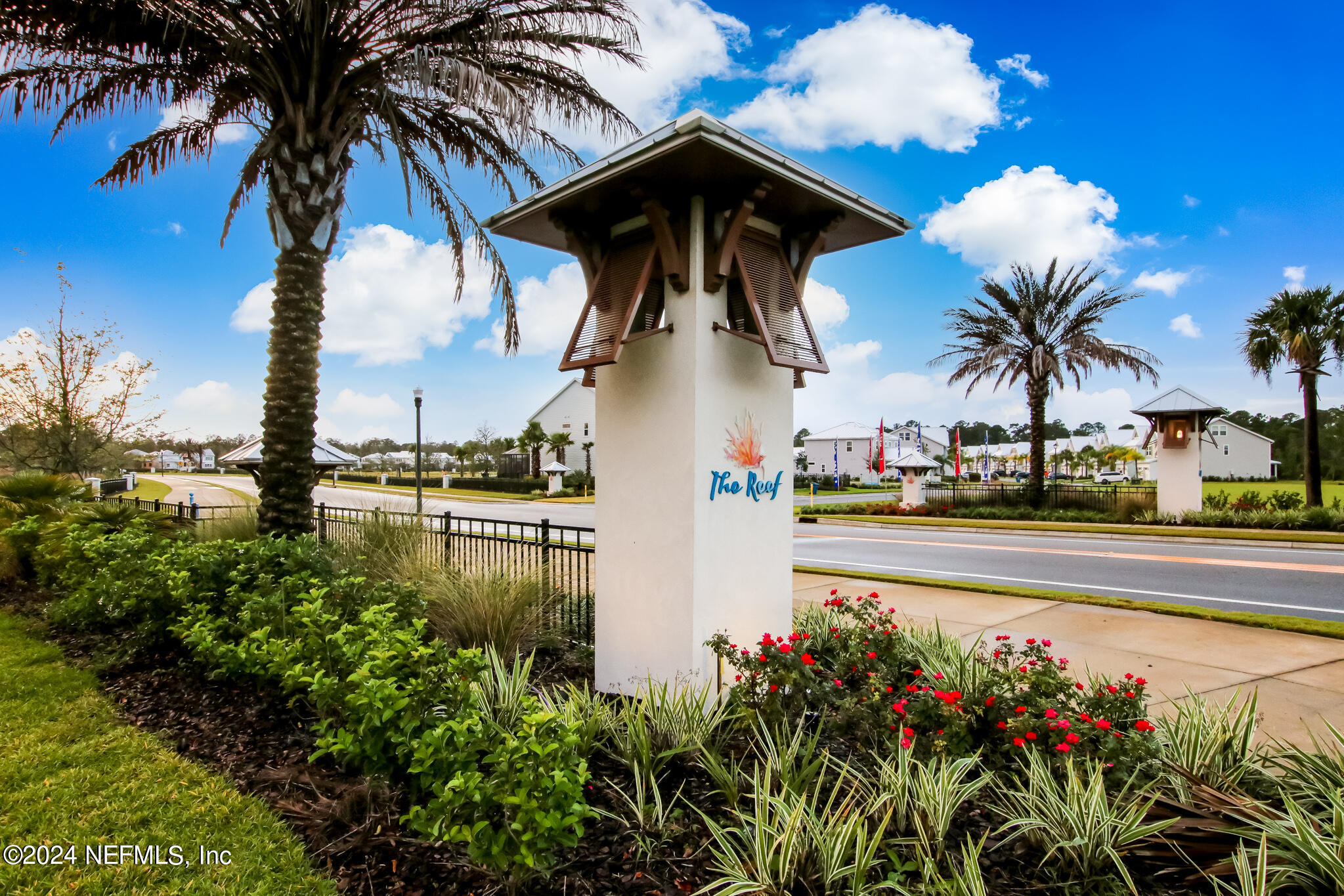 55 Rum Runner Way St. Johns, FL 32259 - Photo 44 of 55 a view of a water fountain and a fountain in the middle of a lake
