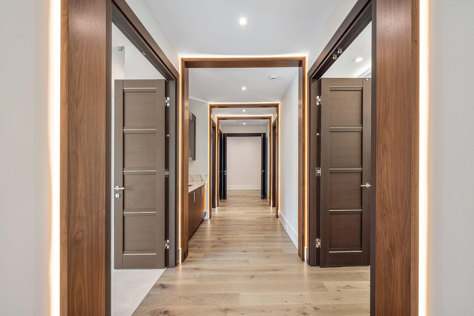 212 Alexander Palm Road Boca Raton, FL 33432 - Photo 55 of 75 a view of a hallway view with wooden floor and staircase