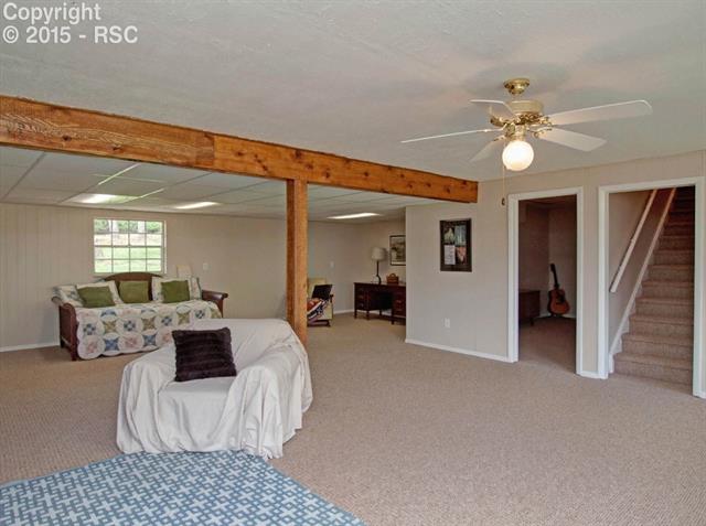 2608 Rigel Drive Colorado Springs, CO 80906 - Photo 19 of 26 Large basement with carpet through-out