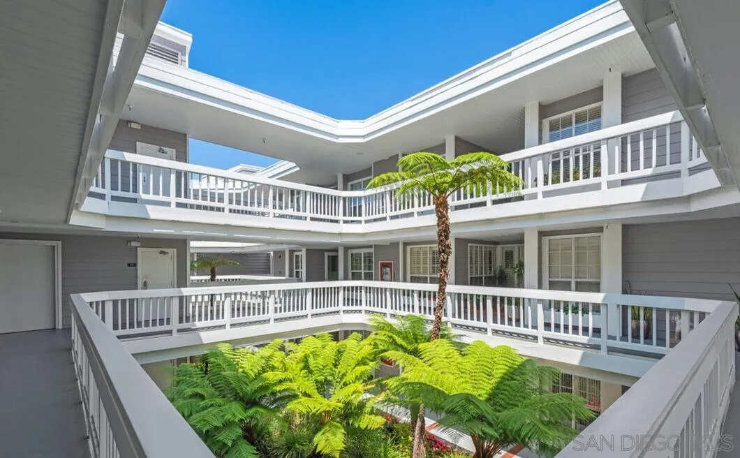 13078 Mindanao Way, Unit 101 Marina del Rey, CA 90292 - Photo 4 of 11 front view of a house with a small yard