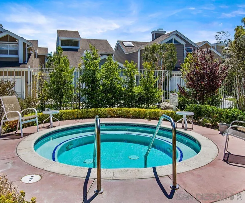 13078 Mindanao Way, Unit 101 Marina del Rey, CA 90292 - Photo 10 of 11 a view of a swimming pool with a patio and a yard