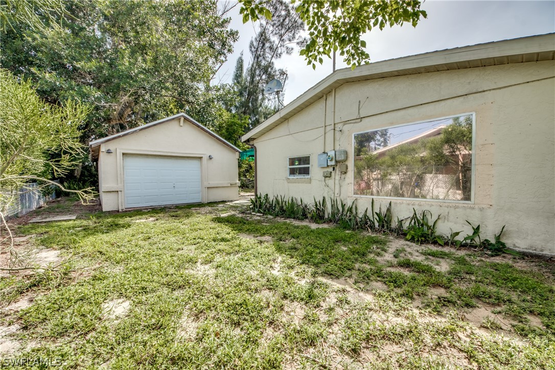18481 Iris Road Fort Myers, FL 33967 - Photo 27 of 28 a view of a house with a yard