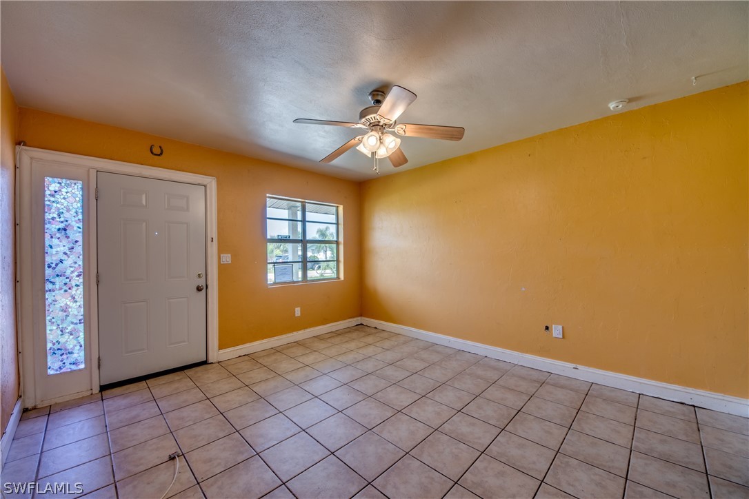 18481 Iris Road Fort Myers, FL 33967 - Photo 4 of 28 a view of an empty room with a window