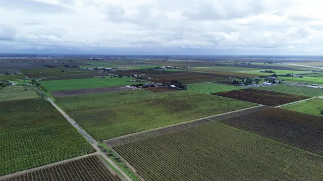 a kitchen with stainless steel appliances white cabinets and a sink