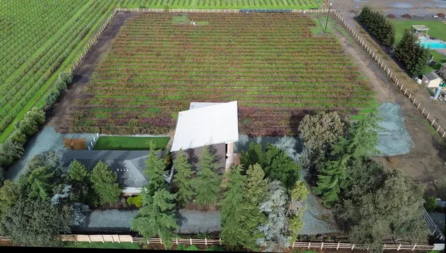 a bathroom with a sink vanity and mirror