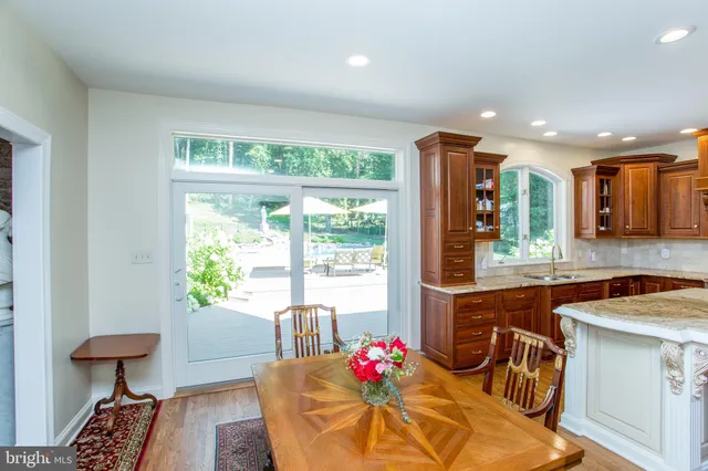 a bedroom with furniture and a wooden floor