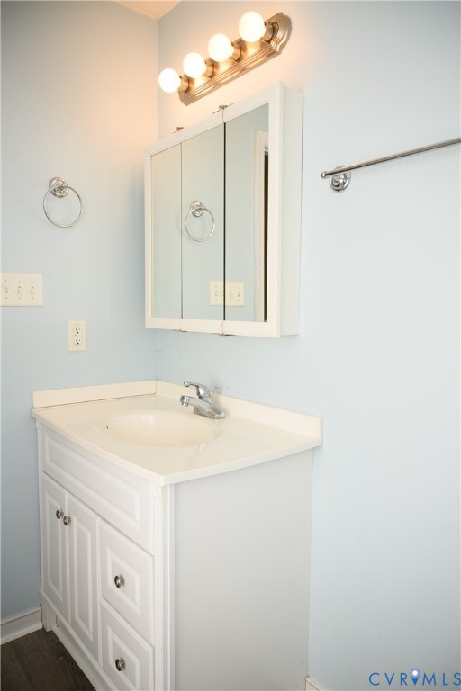 2143 Mountain View Road Powhatan, VA 23139 - Photo 18 of 34 a bathroom with a sink vanity and a mirror