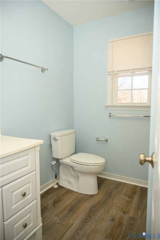 2143 Mountain View Road Powhatan, VA 23139 - Photo 19 of 34 a bathroom with a toilet sink and vanity
