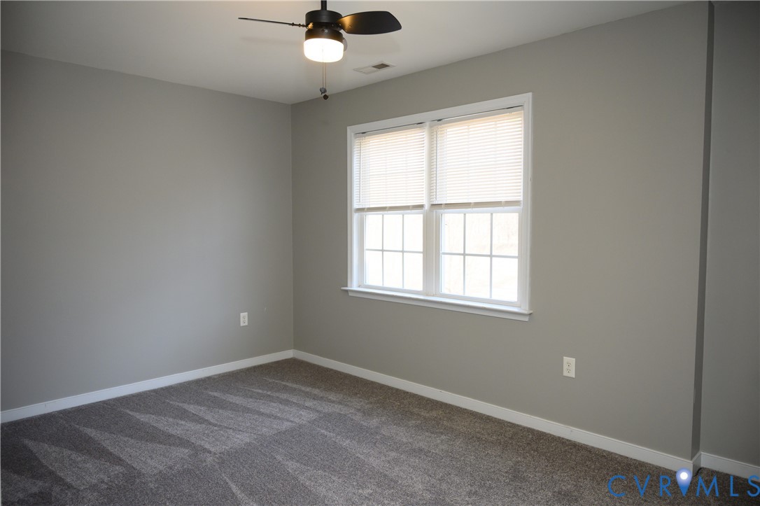 2143 Mountain View Road Powhatan, VA 23139 - Photo 21 of 34 an empty room with a window