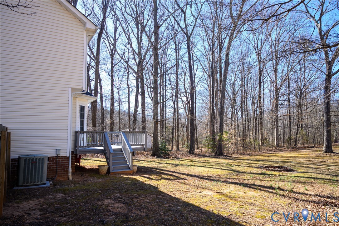2143 Mountain View Road Powhatan, VA 23139 - Photo 30 of 34 a view of a house with a yard and sitting area