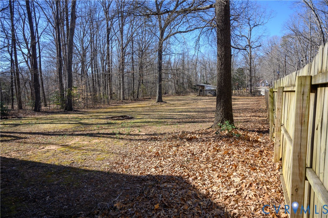 2143 Mountain View Road Powhatan, VA 23139 - Photo 31 of 34 a view of a yard with large trees