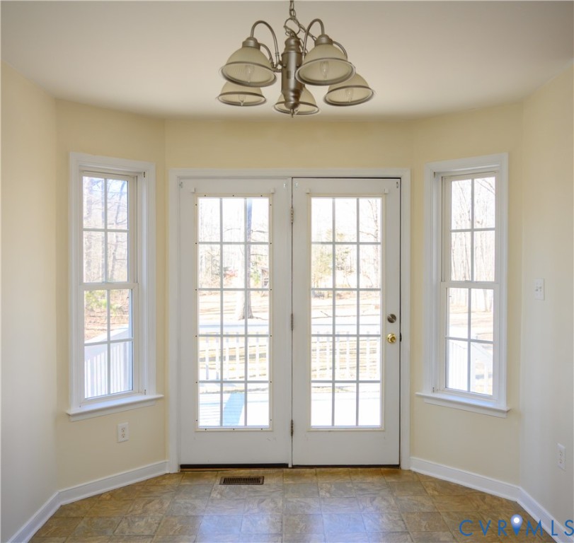 2143 Mountain View Road Powhatan, VA 23139 - Photo 8 of 34 a view of an empty room with a window