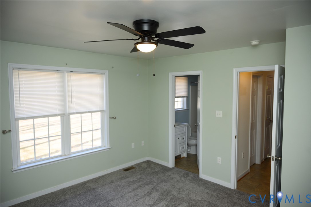2143 Mountain View Road Powhatan, VA 23139 - Photo 9 of 34 a view of an empty room with a window