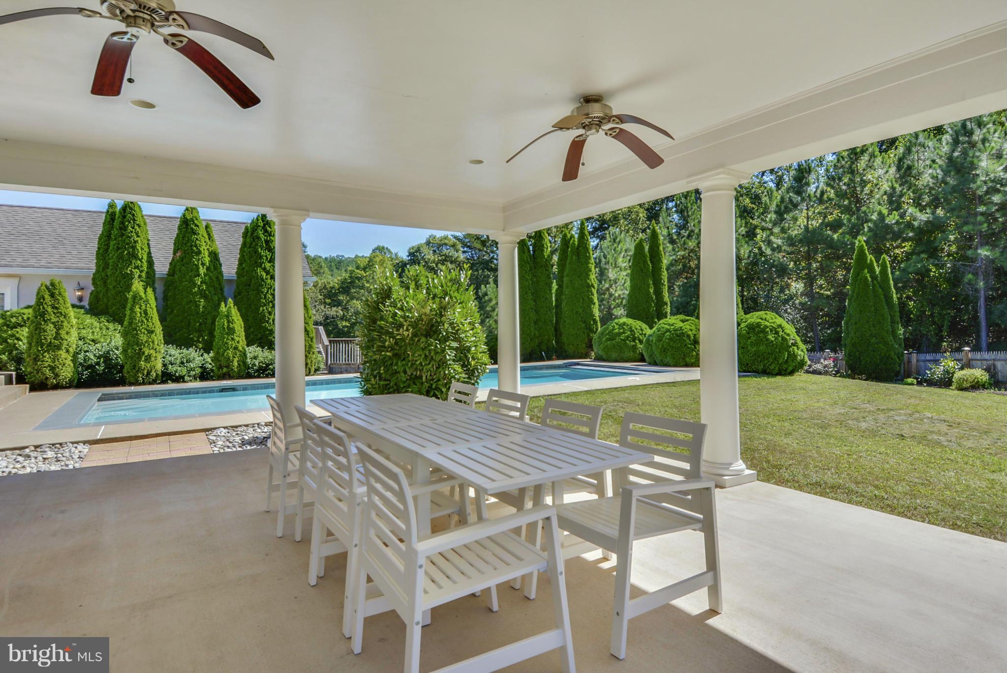 9859 Conde Road Marshall, VA 20115 - Photo 22 of 29 a view of a swimming pool and outdoor space