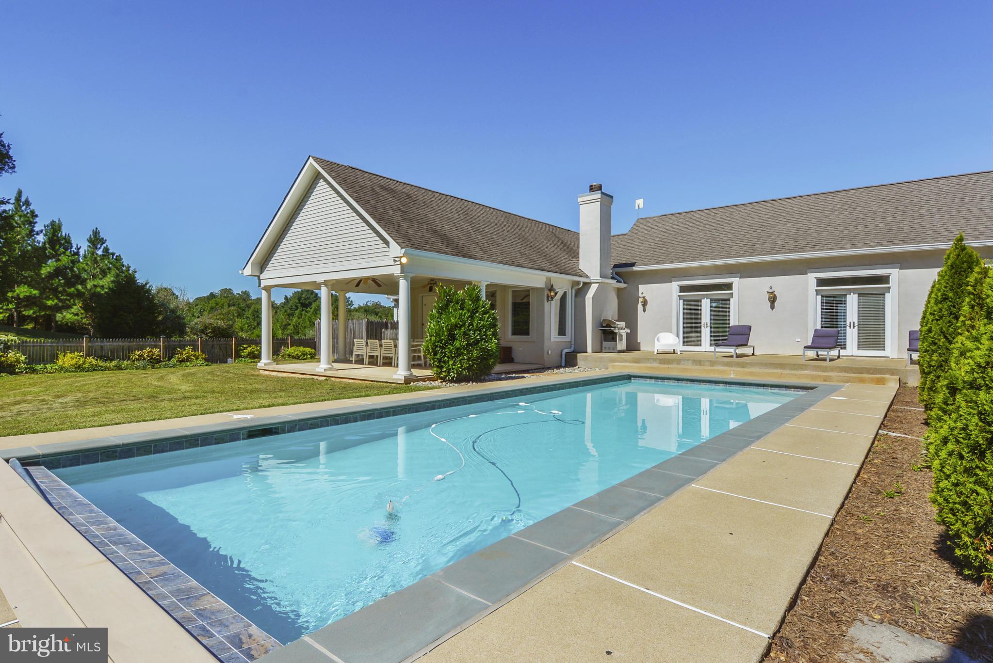9859 Conde Road Marshall, VA 20115 - Photo 24 of 29 a view of house with a swimming pool