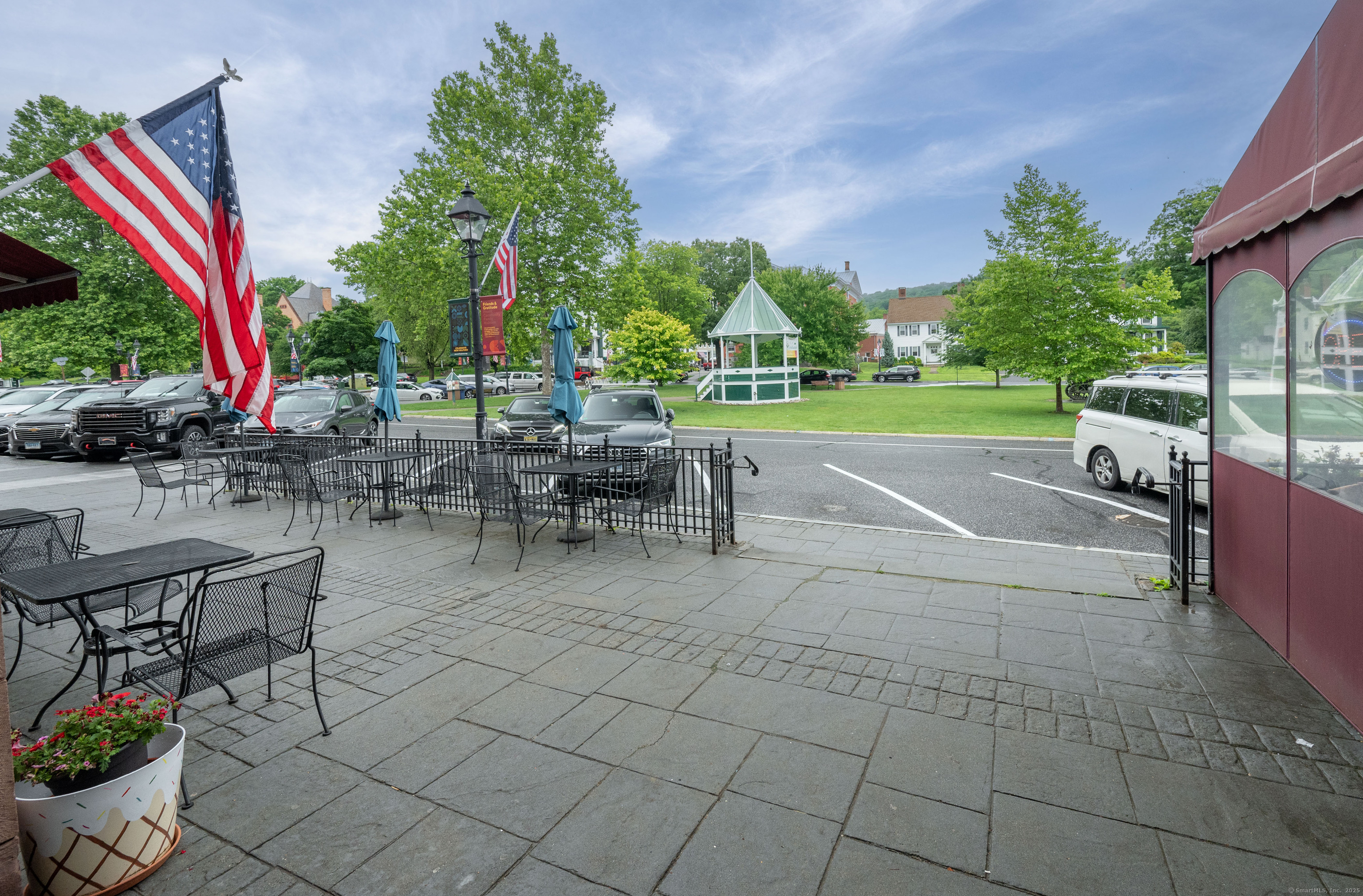 7 Main Street, Unit 3 New Milford, CT 06776 - Photo 1 of 1 a view of a patio with a table and chairs