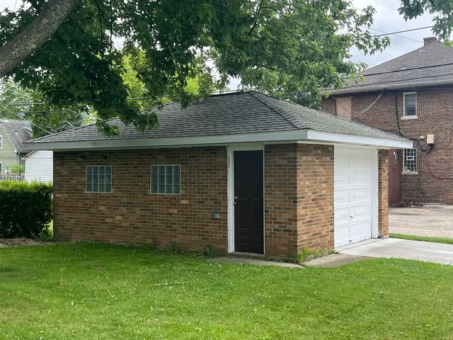 a view of a house with a garden