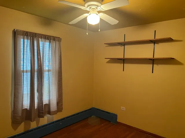 a view of a room with racks on the wall