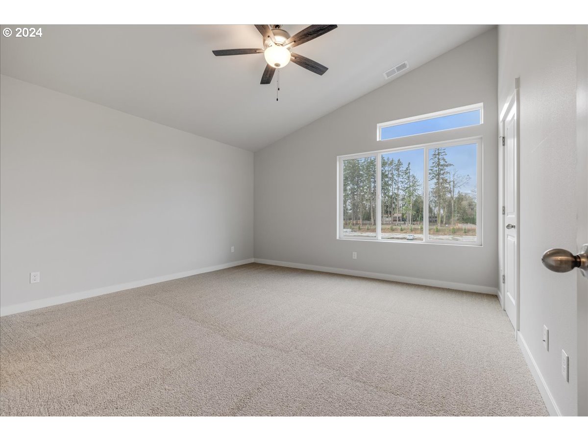 1485 North Chehalis Lane Newberg, OR 97132 - Photo 23 of 38 a view of an empty room with a window