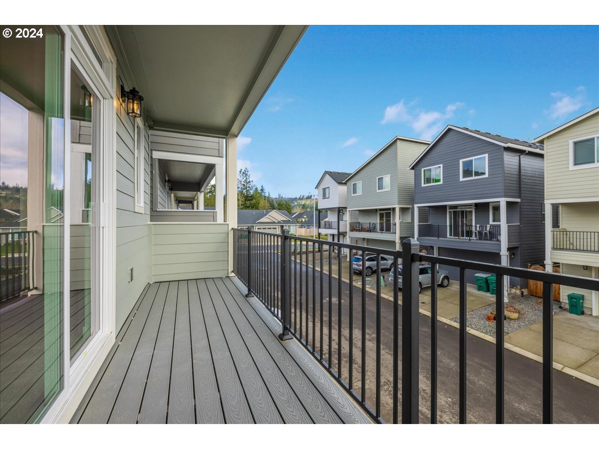 1485 North Chehalis Lane Newberg, OR 97132 - Photo 35 of 38 a view of a house with a balcony