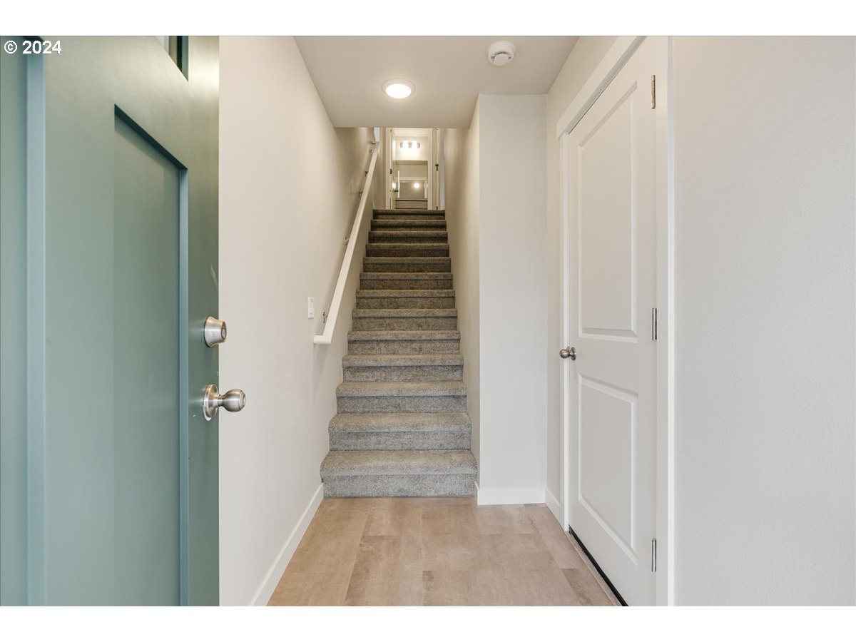 1485 North Chehalis Lane Newberg, OR 97132 - Photo 6 of 38 a view of an entryway with staircase