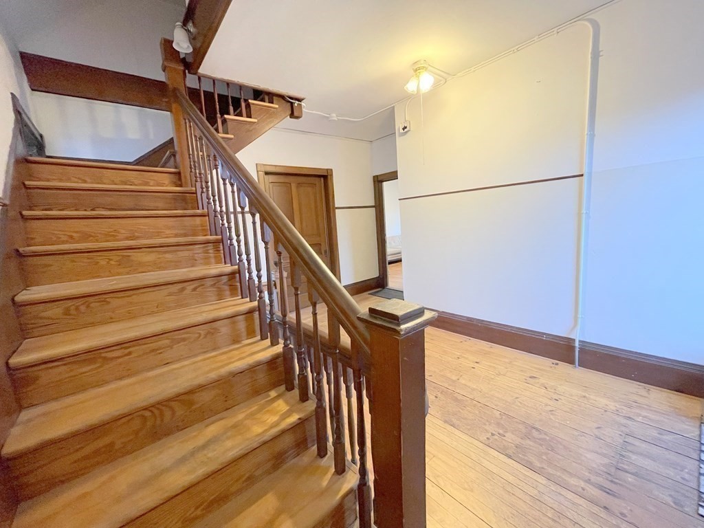 16 Dayton Street, Unit 2F Worcester, MA 01609 - Photo 16 of 21 a view of entryway and hall with wooden floor
