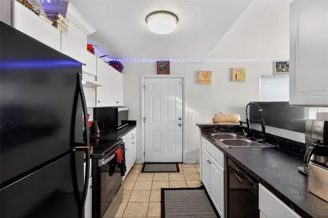 a bedroom with a bed and a closet