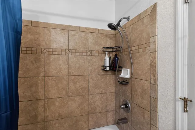 a view of a hallway with closet