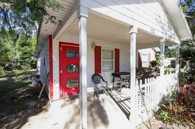 a view of a tree in front of a house