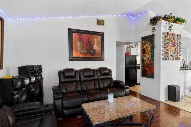 a kitchen with a sink and a stove top oven