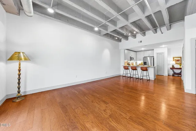 a view of a livingroom with wooden floor