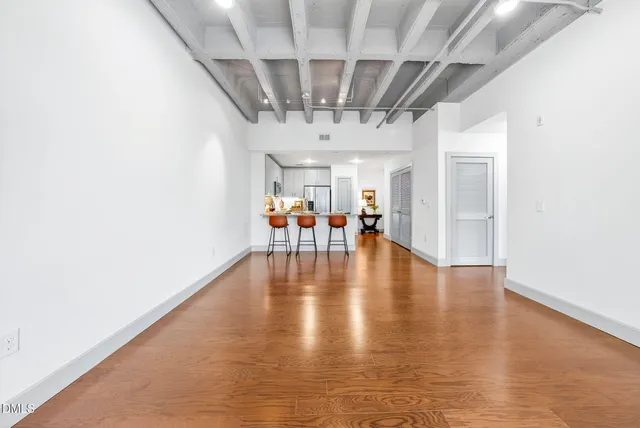 a view of a livingroom with furniture pool table and chairs