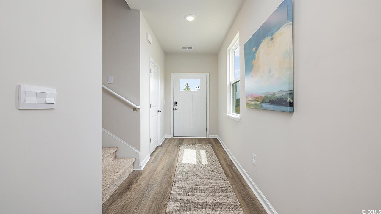 303 Ridley Street Longs, SC 29568 - Photo 2 of 31 Entryway featuring wood finished floors and recessed lighting