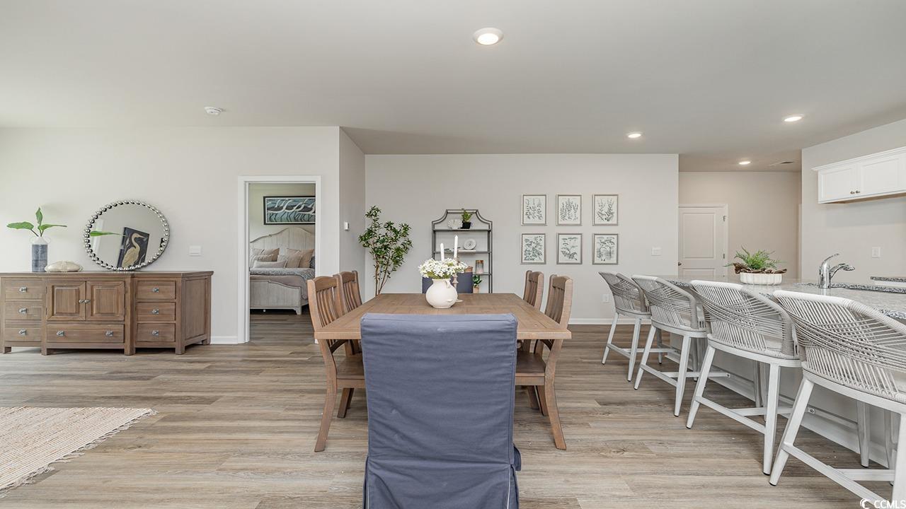303 Ridley Street Longs, SC 29568 - Photo 8 of 31 Dining space with recessed lighting and light wood-type flooring