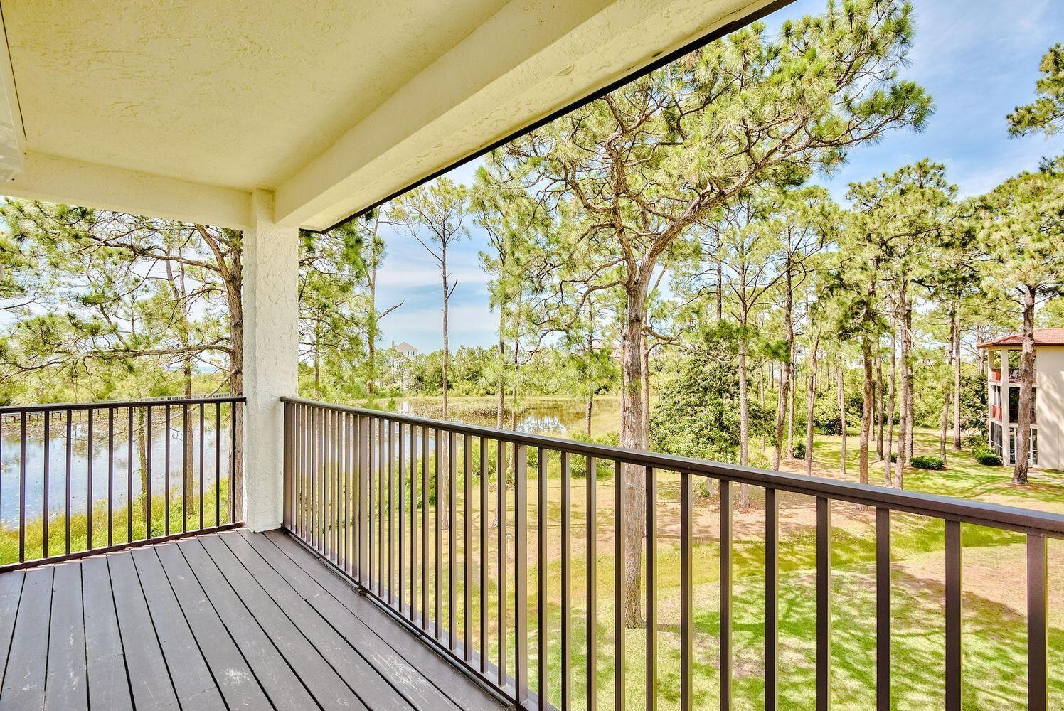114 Mar-A-Lago Boulevard, Unit 1 Santa Rosa Beach, FL 32459 - Photo 13 of 28 a view of balcony with wooden floor