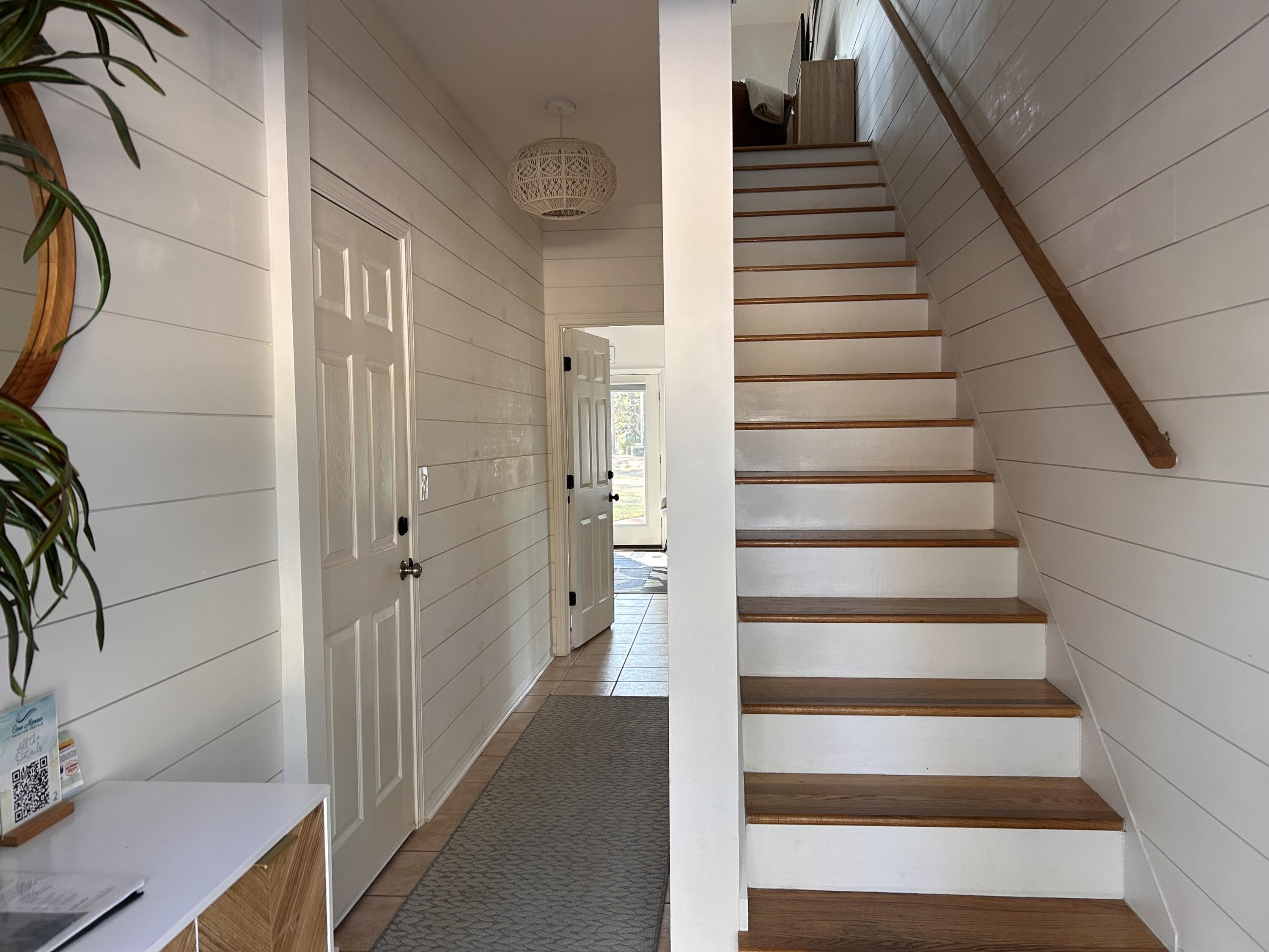 114 Mar-A-Lago Boulevard, Unit 1 Santa Rosa Beach, FL 32459 - Photo 29 of 49 a view of a hallway to a house
