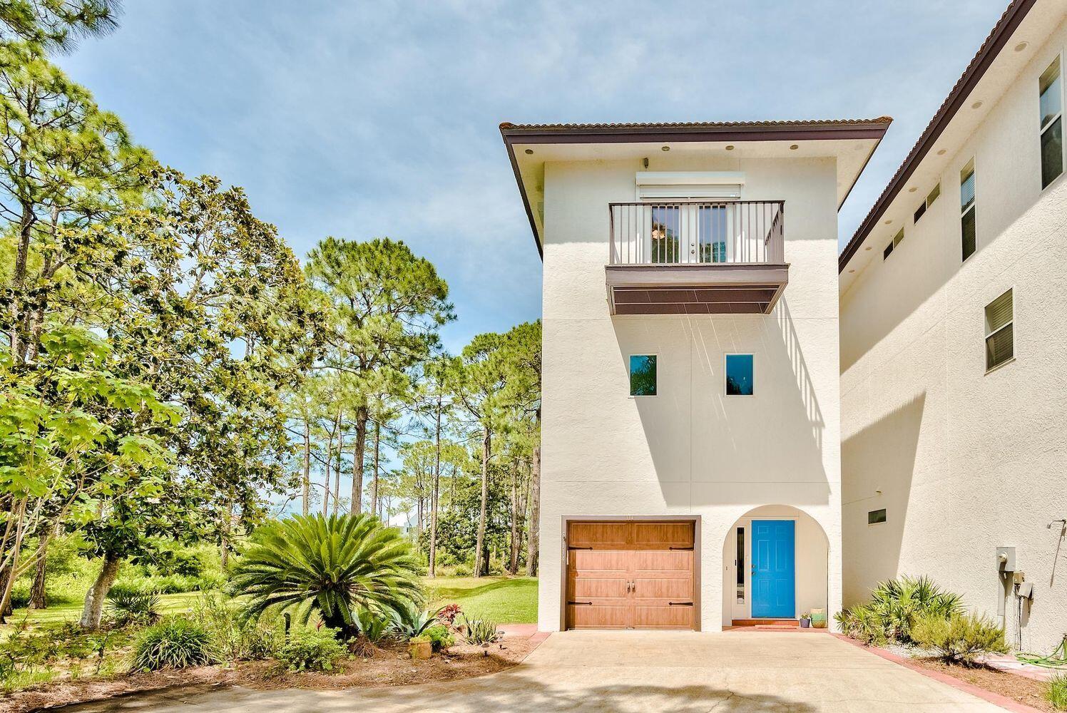 114 Mar-A-Lago Boulevard, Unit 1 Santa Rosa Beach, FL 32459 - Photo 3 of 28 a front view of a house with a yard