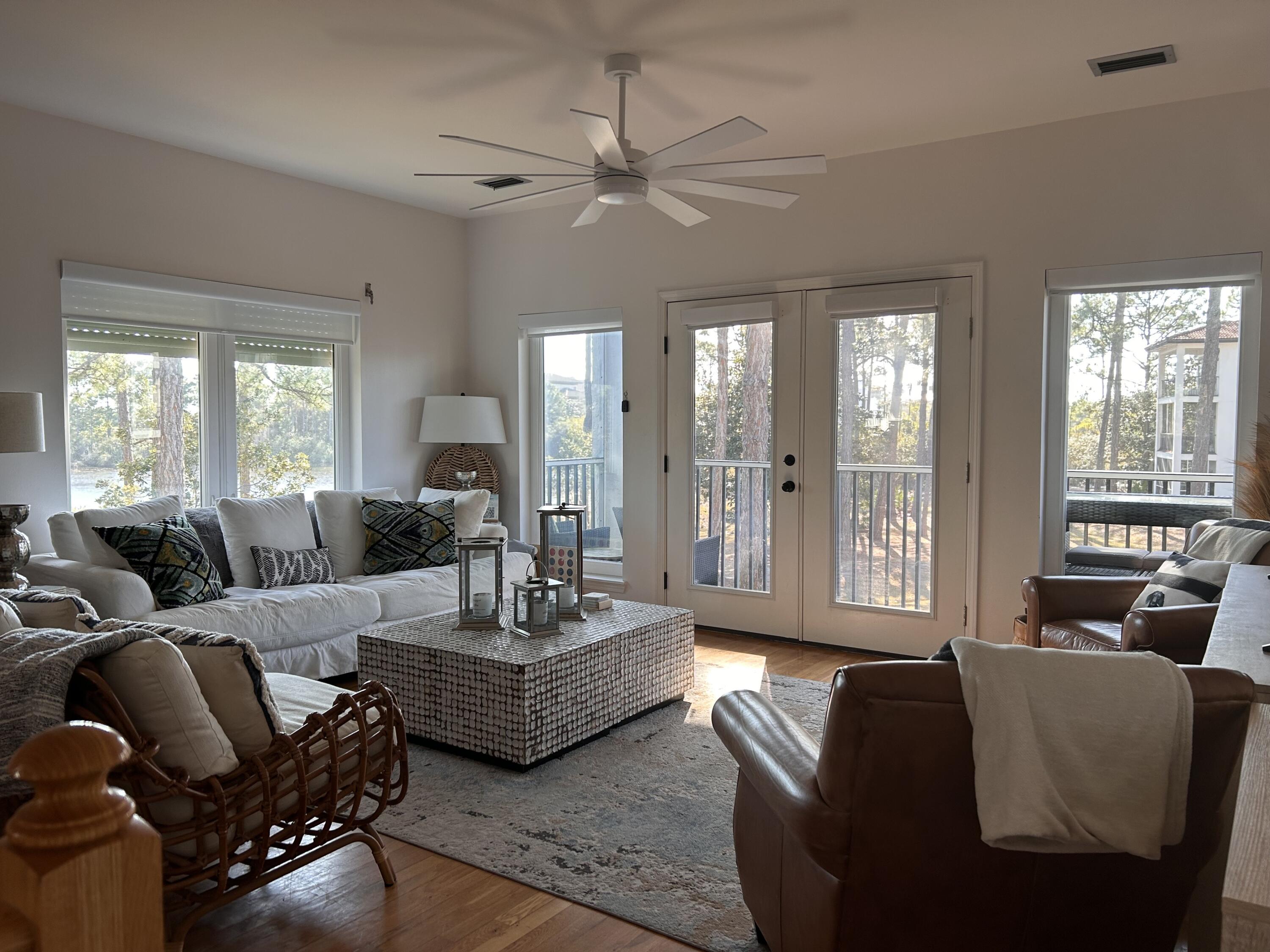114 Mar-A-Lago Boulevard, Unit 1 Santa Rosa Beach, FL 32459 - Photo 34 of 49 a living room with furniture and a large window