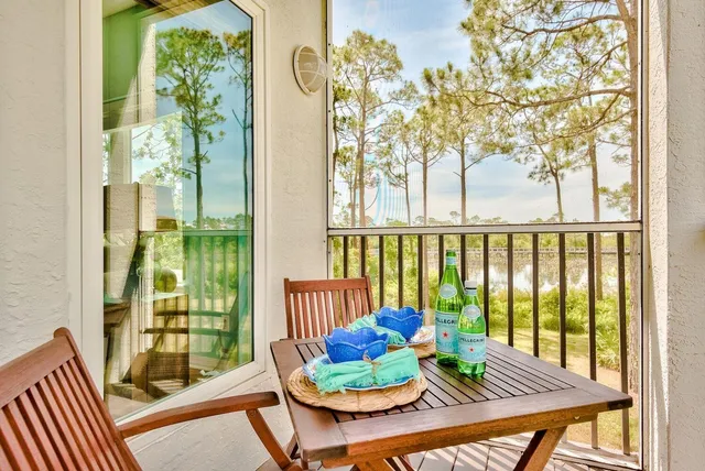 a view of a balcony with chairs